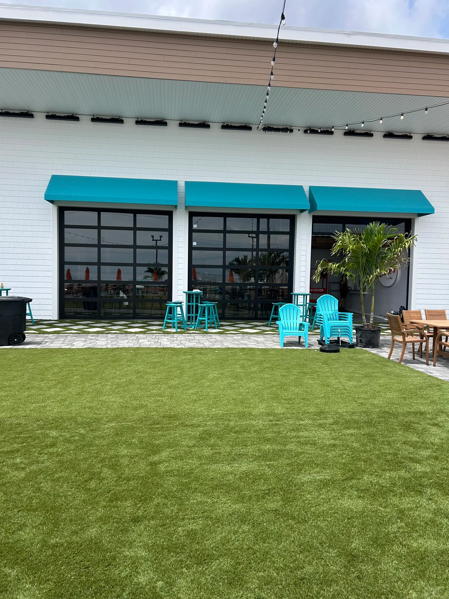 Security grille installed across a wide commercial opening